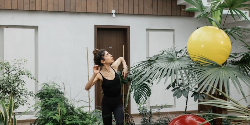 A calm yoga space with natural light and plants.